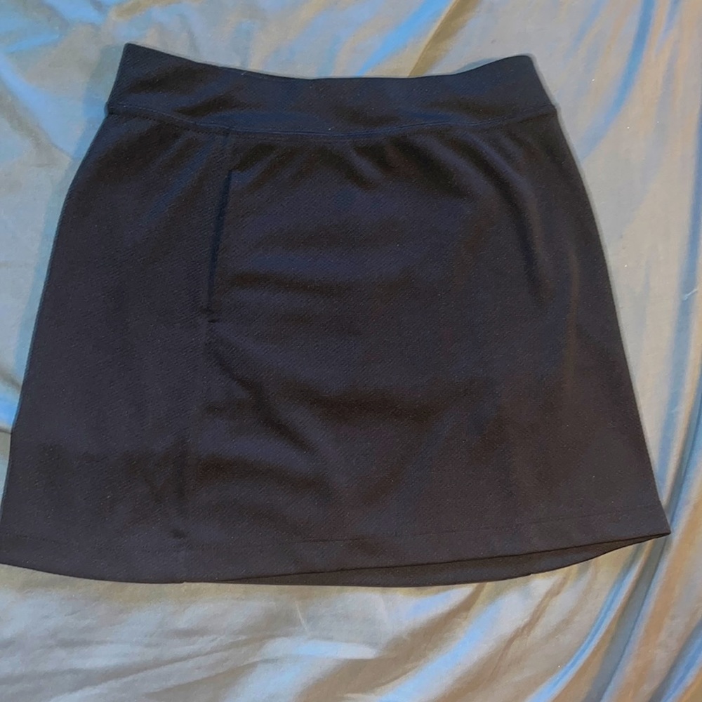 Women’s callaway golf SKORT- black-small- BRAND NEW condition -100% polyester